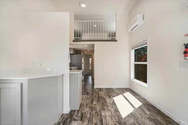 a view of entryway with wooden floor