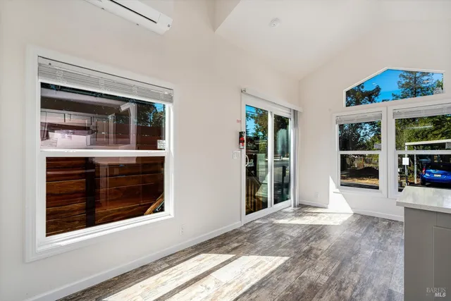 a view of an entryway with a kitchen