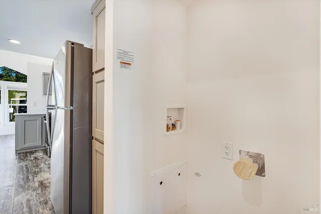 a bathroom with a shower and mirror