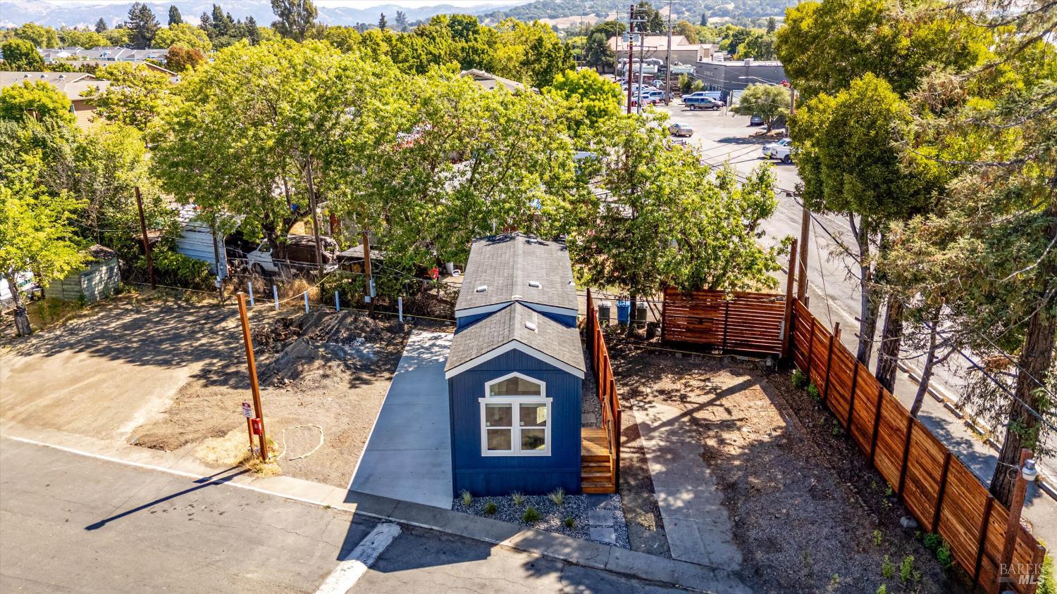 101 Colgan Avenue, Unit 2 Santa Rosa, CA 95404 - Photo 5 of 32 a view of a large tree in front of a house