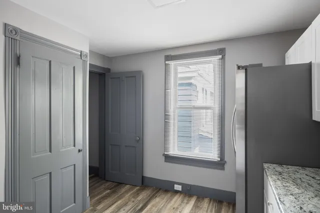 a view of livingroom with furniture and a window