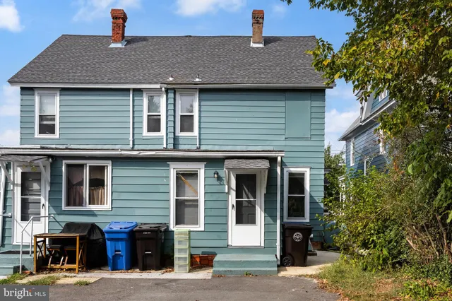 a front view of a house with street