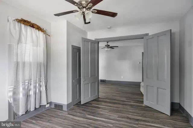a view of entryway with wooden floor
