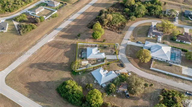 an aerial view of a highlighted house