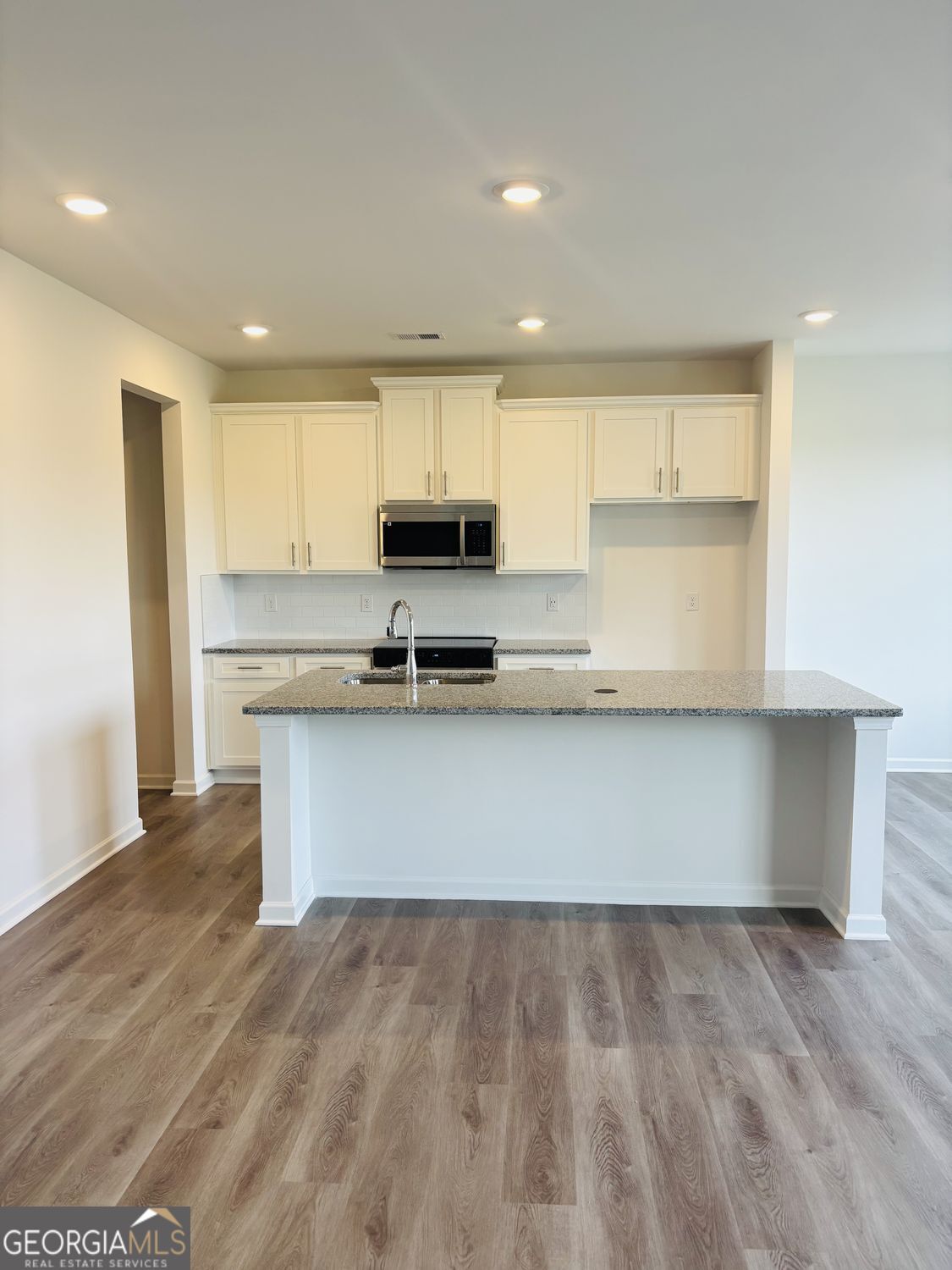 5984 Spring Way Lithonia, GA 30038 - Photo 5 of 17 a view of kitchen with stainless steel appliances cabinets