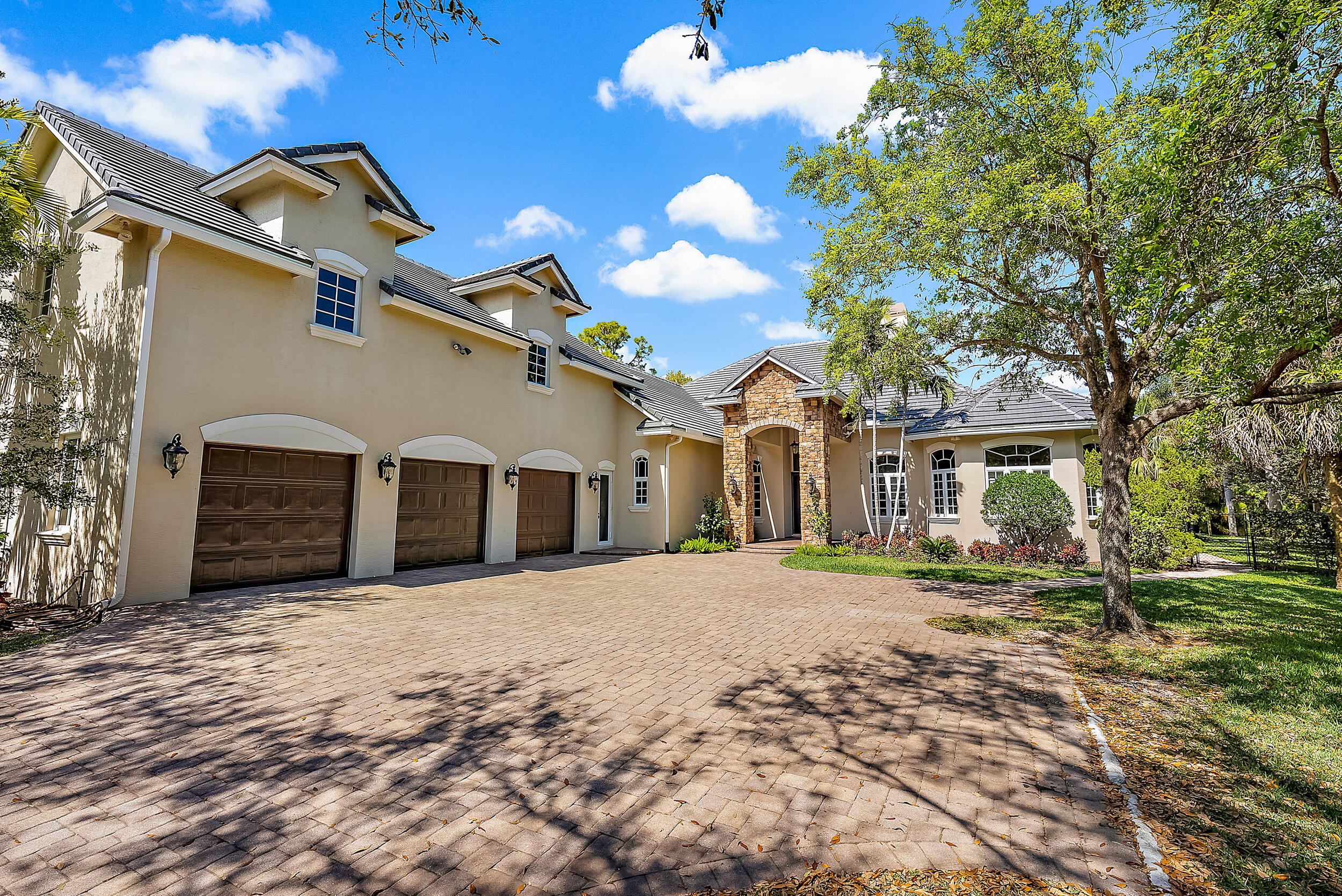 5745 Pennock Point Road Jupiter, FL 33458 - Photo 2 of 31 Front Exterior
