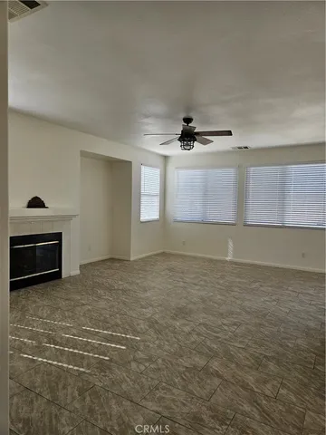 a view of a kitchen with a sink and microwave