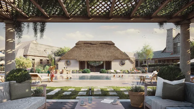 a front view of a house with swimming pool having outdoor seating