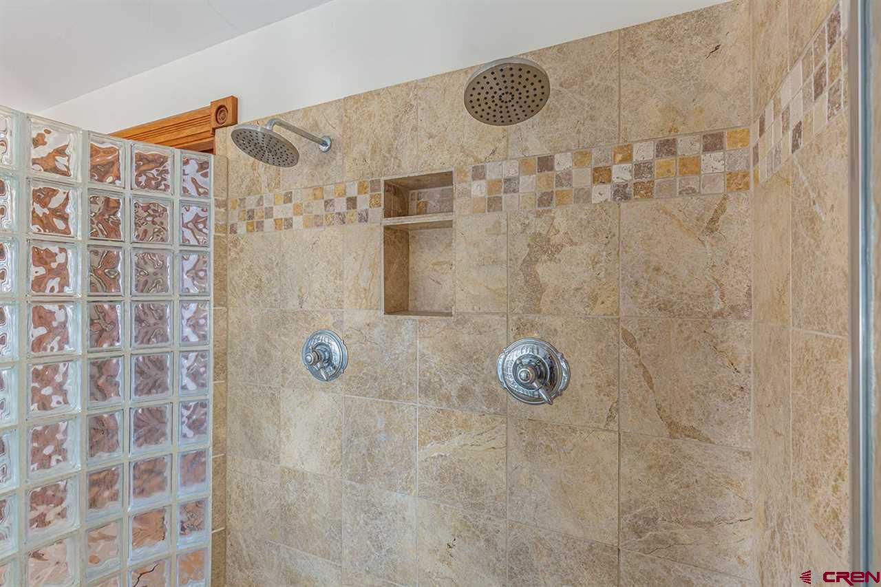 2529 County Road 124 Mancos, CO 81328 - Photo 20 of 34 a bathroom with a shower