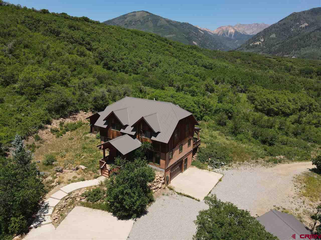 2529 County Road 124 Mancos, CO 81328 - Photo 34 of 34 an aerial view of a house with mountain view