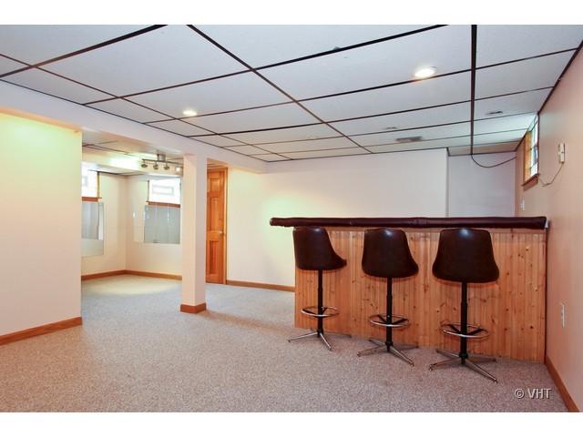 8400 South Kenneth Avenue Chicago, IL 60652 - Photo 14 of 16 a living room with a couch and a table
