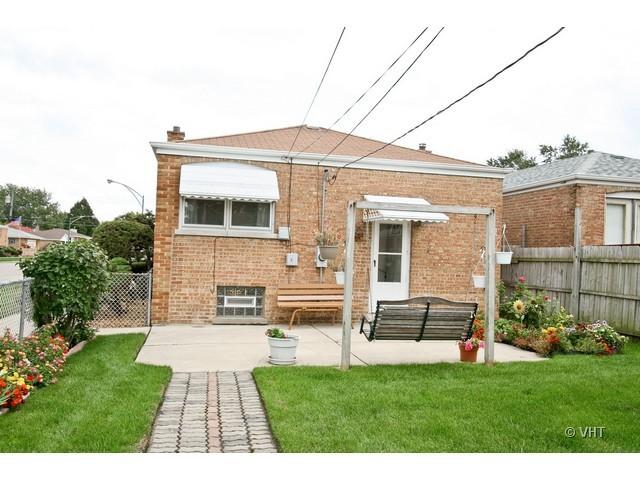 8400 South Kenneth Avenue Chicago, IL 60652 - Photo 15 of 16 a view of a house with a yard