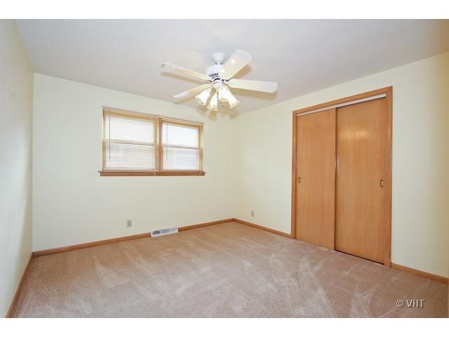8400 South Kenneth Avenue Chicago, IL 60652 - Photo 9 of 16 a view of an empty room with a window