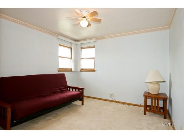 8400 South Kenneth Avenue Chicago, IL 60652 - Photo 10 of 16 a living room with furniture and a window