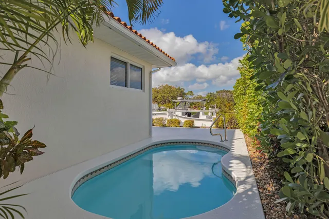 a house view with a garden space