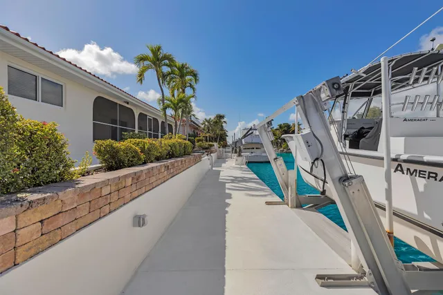 a front view of a house with a yard and a garage