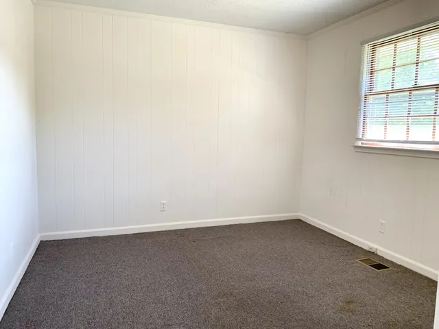 an empty room with a door