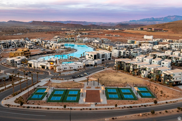 762 West Periwinkle Lane, Unit 102 St. George, UT 84790 - Photo 34 of 40 Aerial view of a mountainous background and a pool