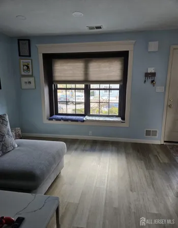 a living room with a large window