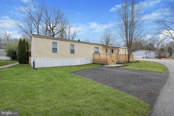 a view of a backyard with a house