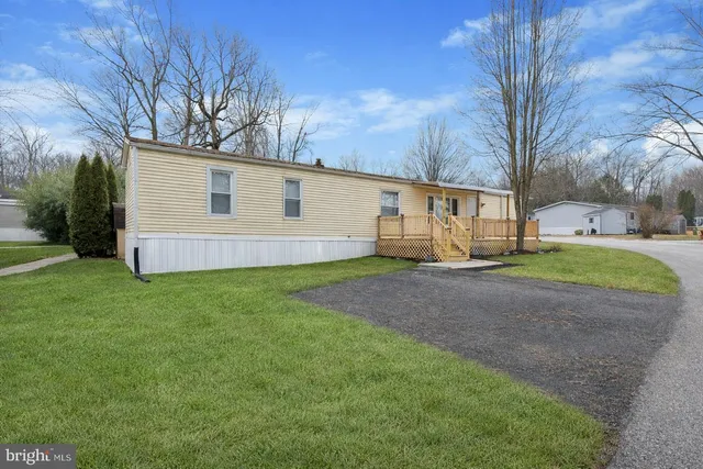 a view of a backyard with a house
