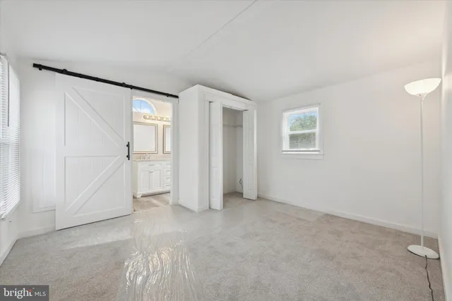 an empty room with windows