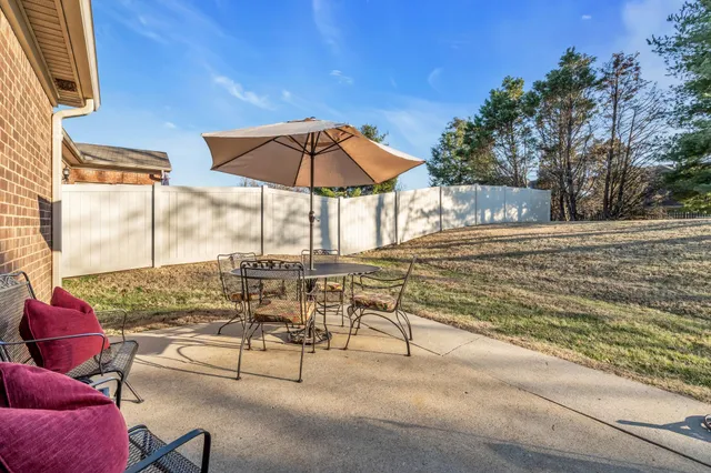 a view of a swimming pool with a lounge chairs