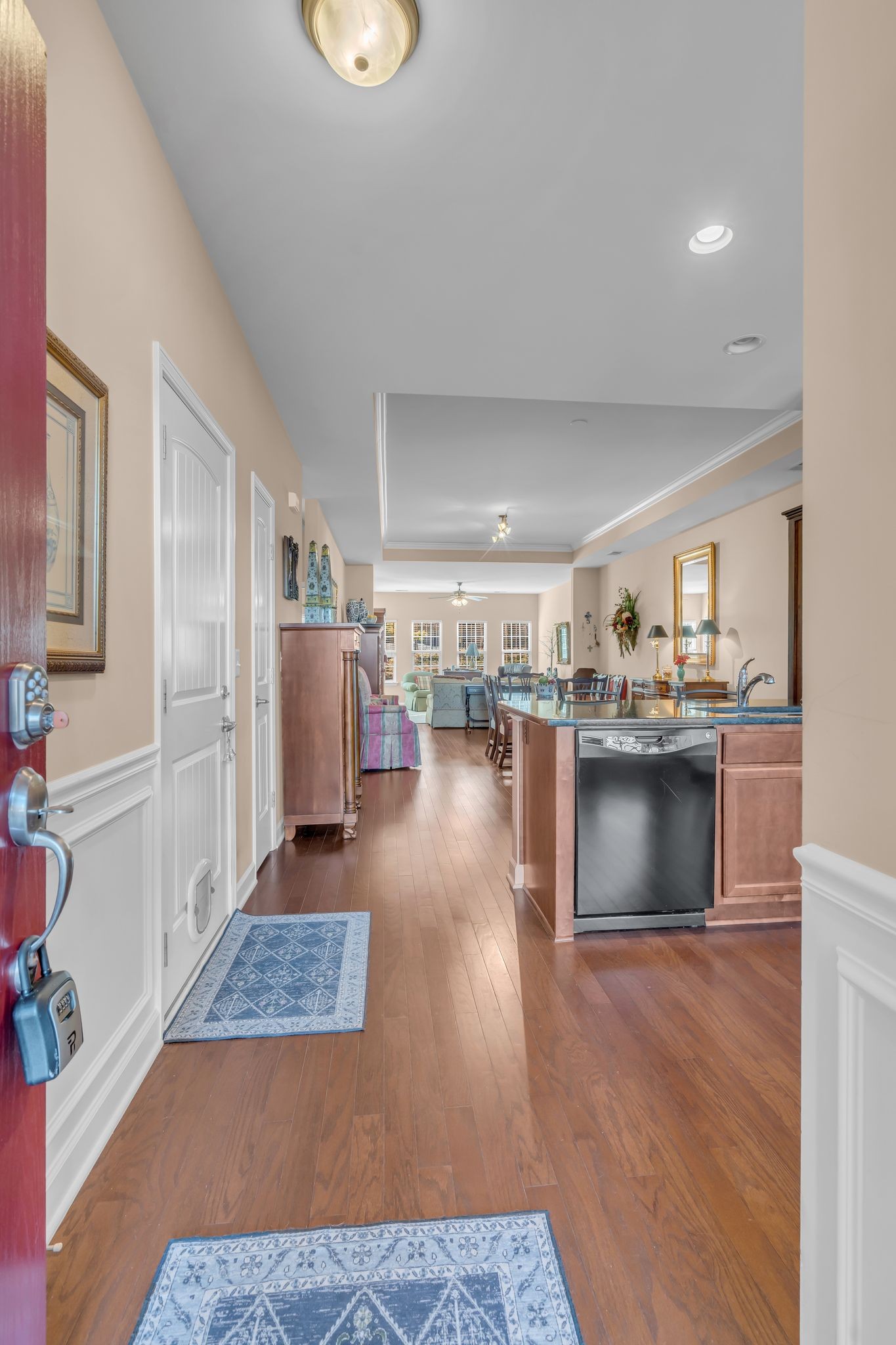 4549 Boxcroft Circle Mount Juliet, TN 37122 - Photo 3 of 28 a living room with stainless steel appliances kitchen island granite countertop a refrigerator and a sink