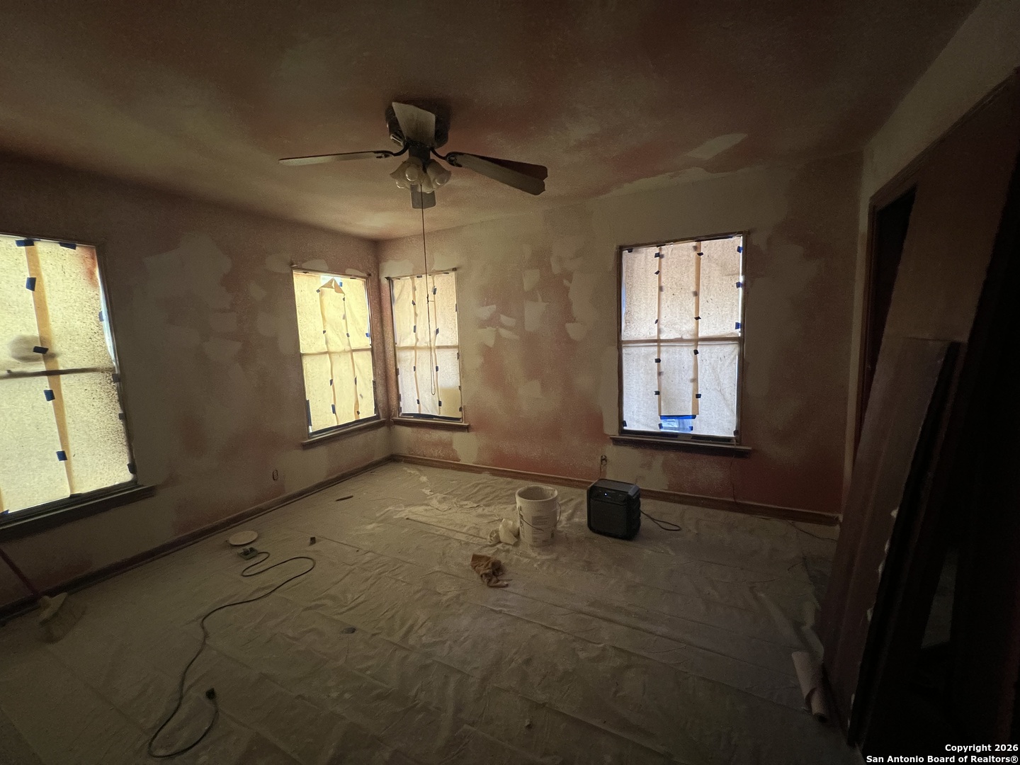 1338 Merida Street San Antonio, TX 78207 - Photo 8 of 16 a bathroom with a window and a shower
