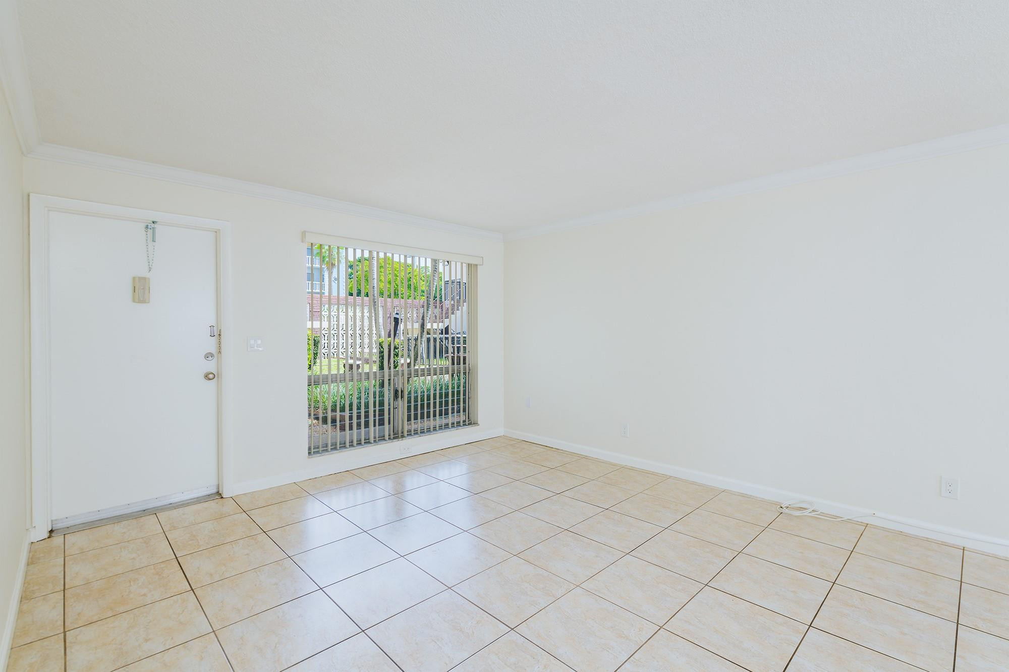 3500 Jackson Street, Unit 105 Hollywood, FL 33021 - Photo 8 of 14 a view of an empty room and window