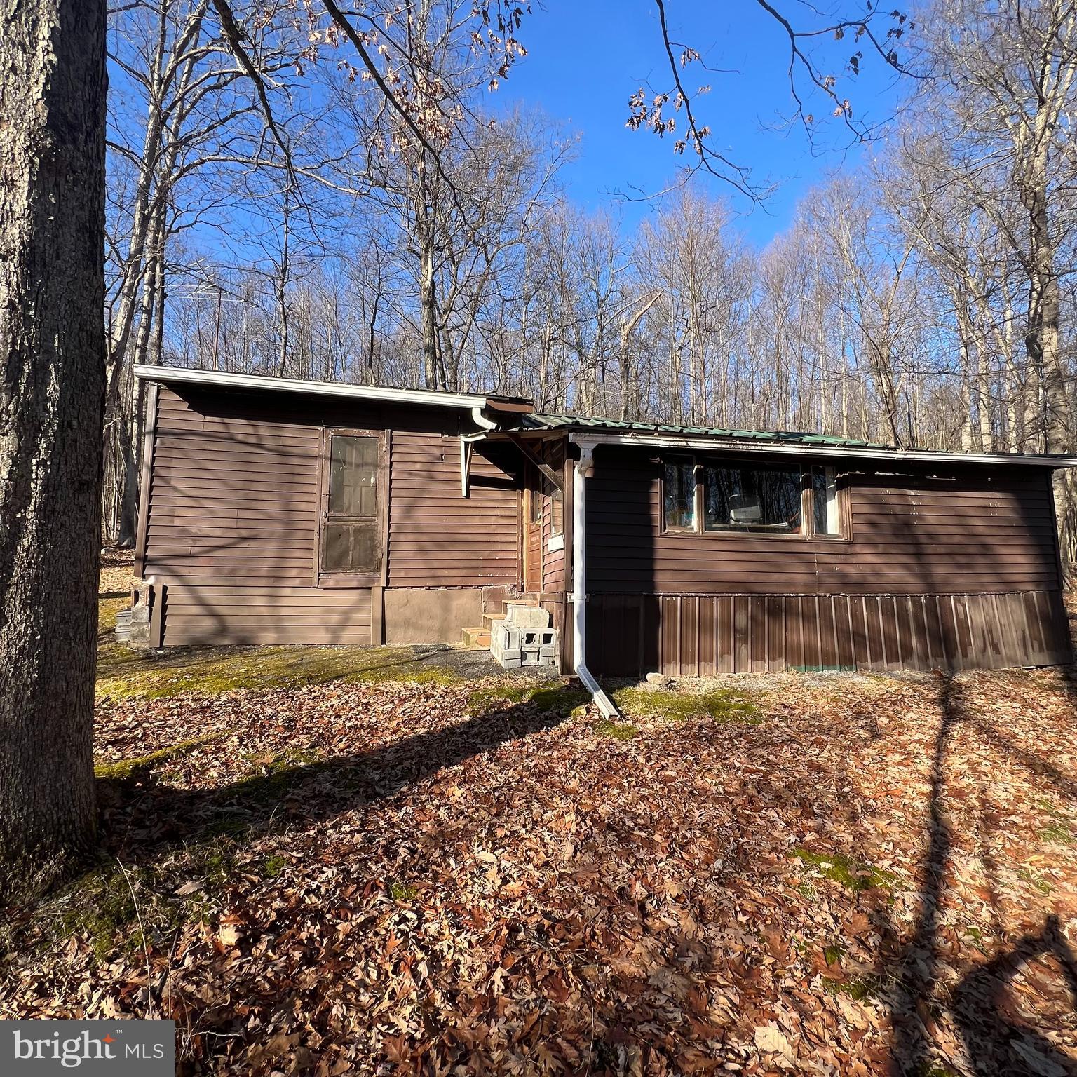 5840 Tram Road Spruce Creek, PA 16683 - Photo 2 of 6 a view of a backyard of the house