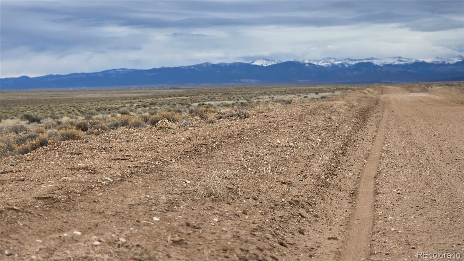 Lot 3 Russ Road Sanford, CO 81151 - Photo 11 of 11 a view of a large body of water with a mountain