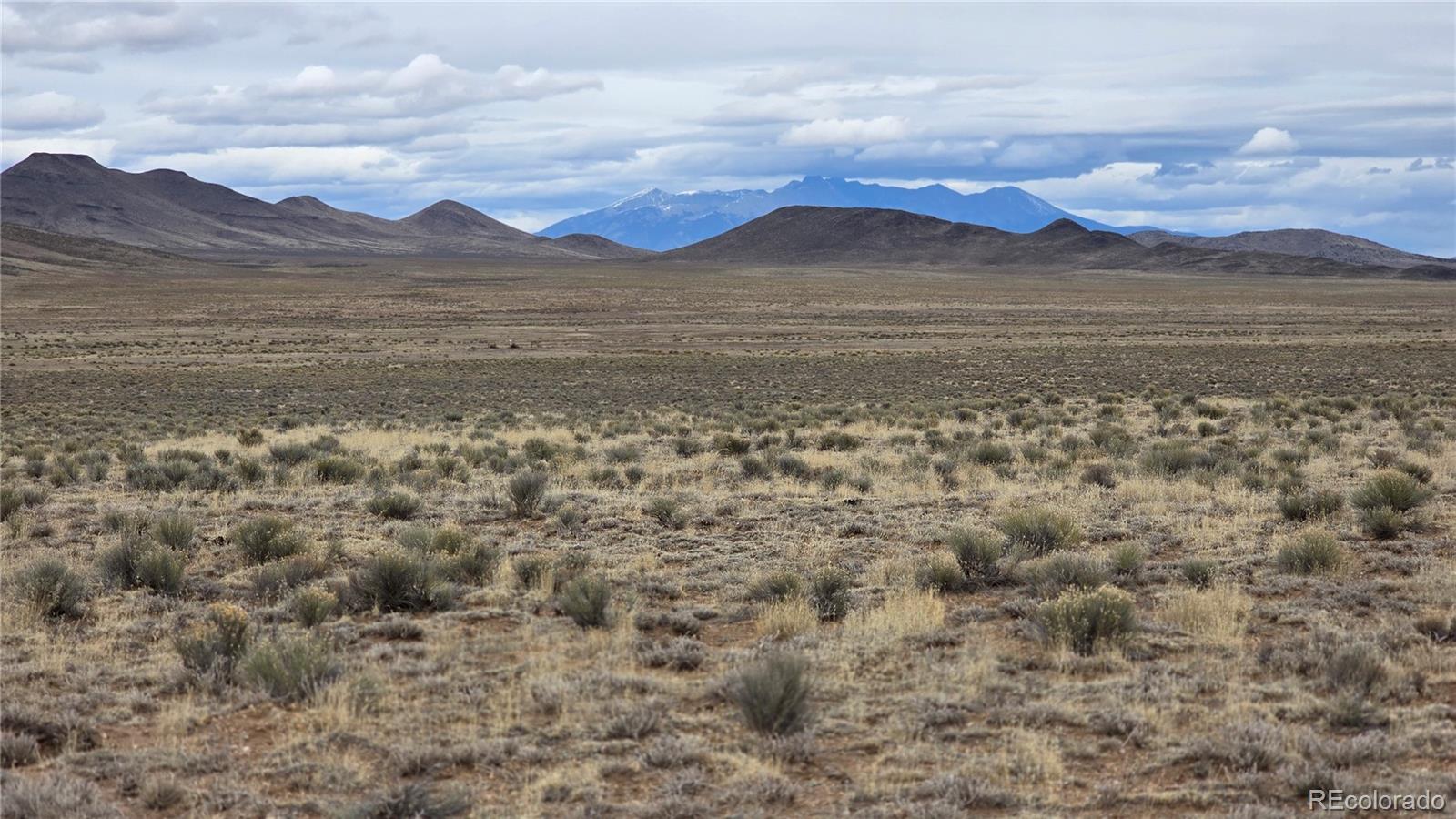 Lot 3 Russ Road Sanford, CO 81151 - Photo 4 of 11 a view of an ocean with a mountain