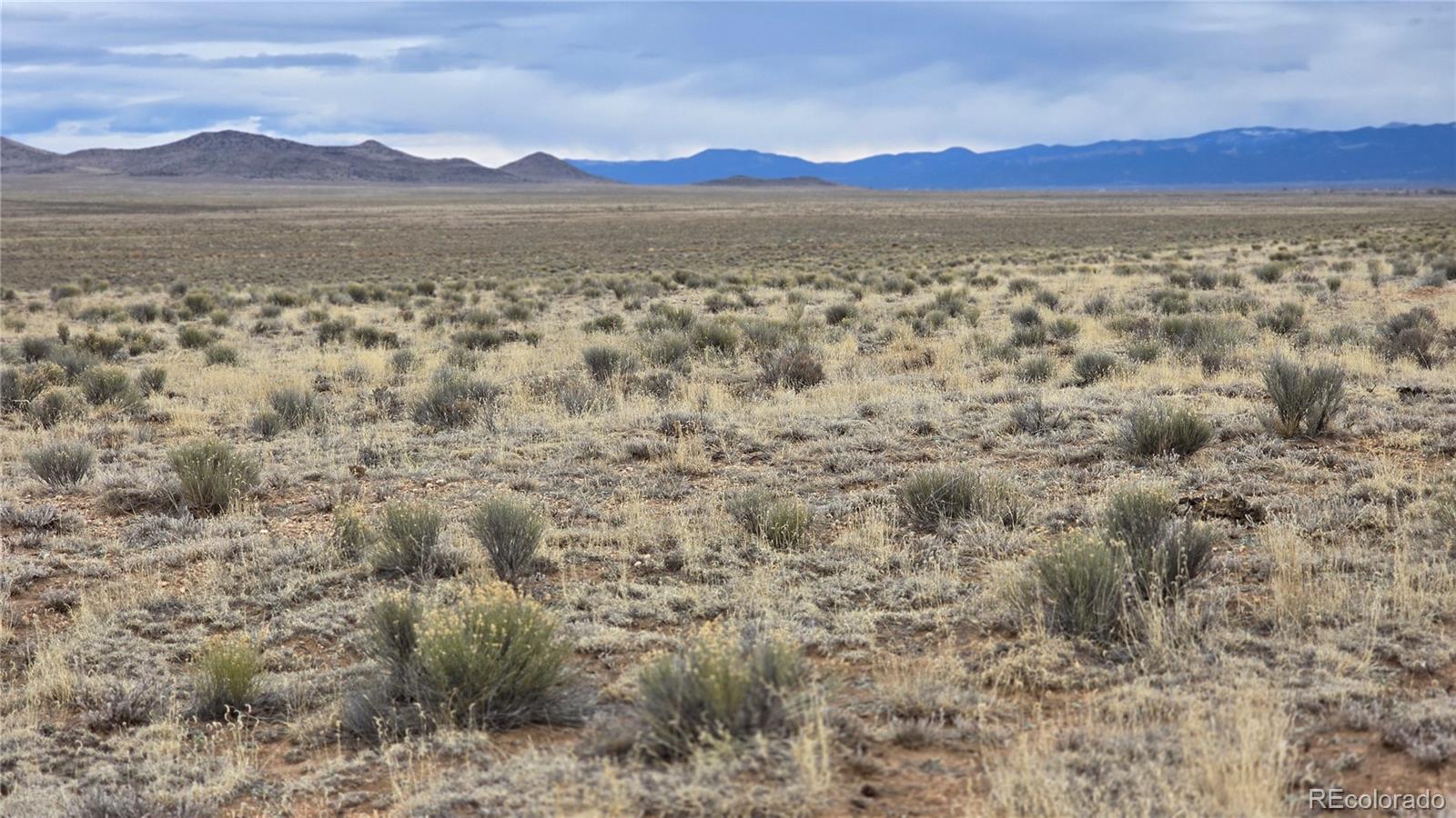 Lot 3 Russ Road Sanford, CO 81151 - Photo 5 of 11 a view of city and mountain