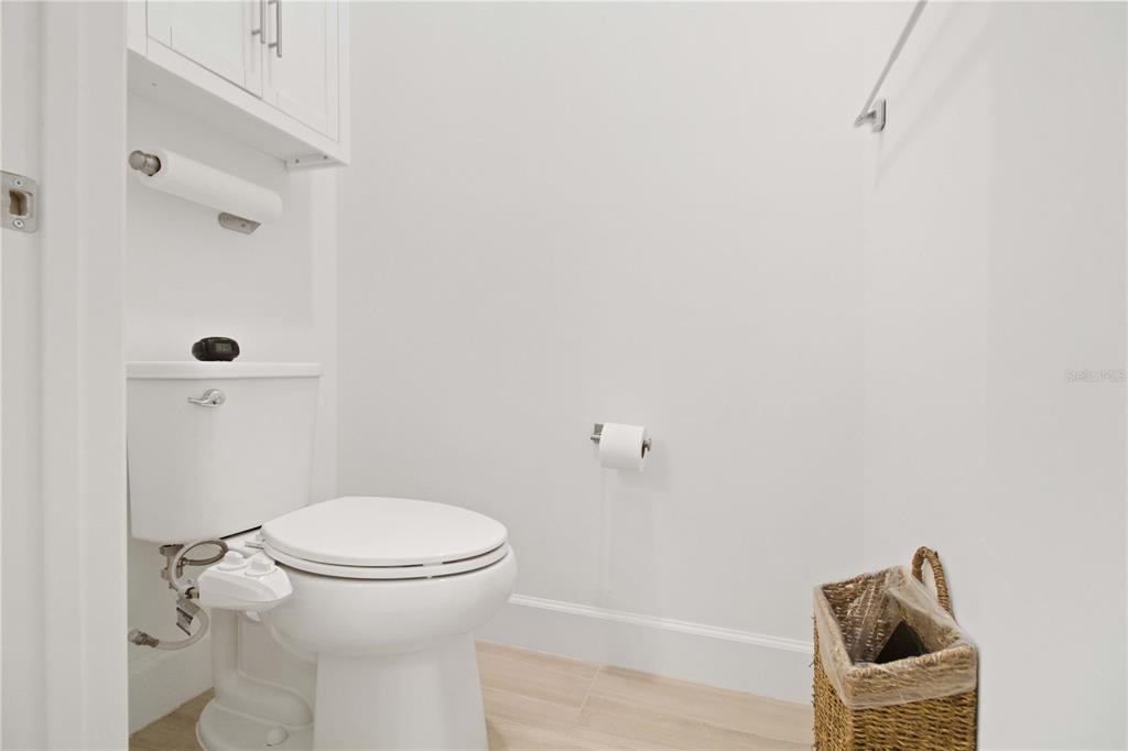 6713 Alstead Circle Lakewood Ranch, FL 34202 - Photo 22 of 35 a bathroom with a toilet and a shower