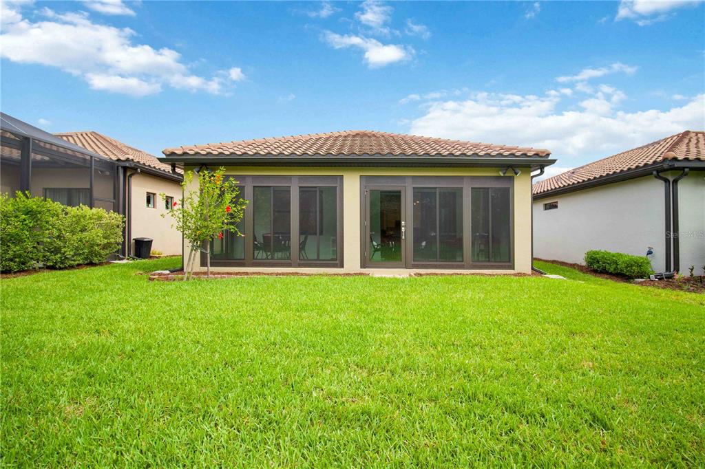 6713 Alstead Circle Lakewood Ranch, FL 34202 - Photo 29 of 35 front view of a house with a yard