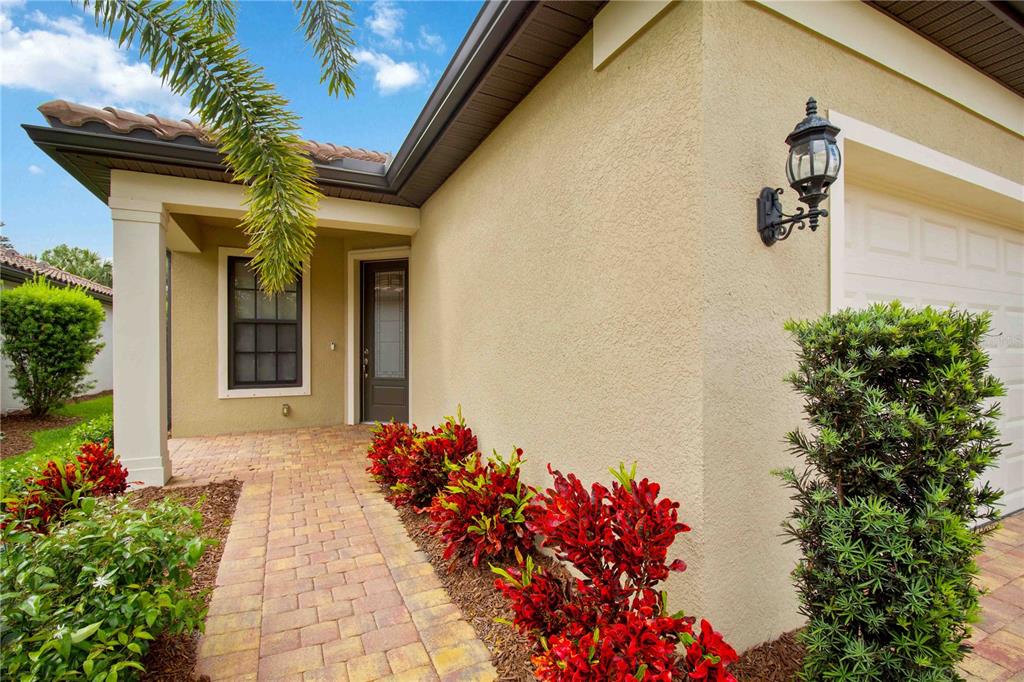 6713 Alstead Circle Lakewood Ranch, FL 34202 - Photo 35 of 35 a front view of a house with a yard