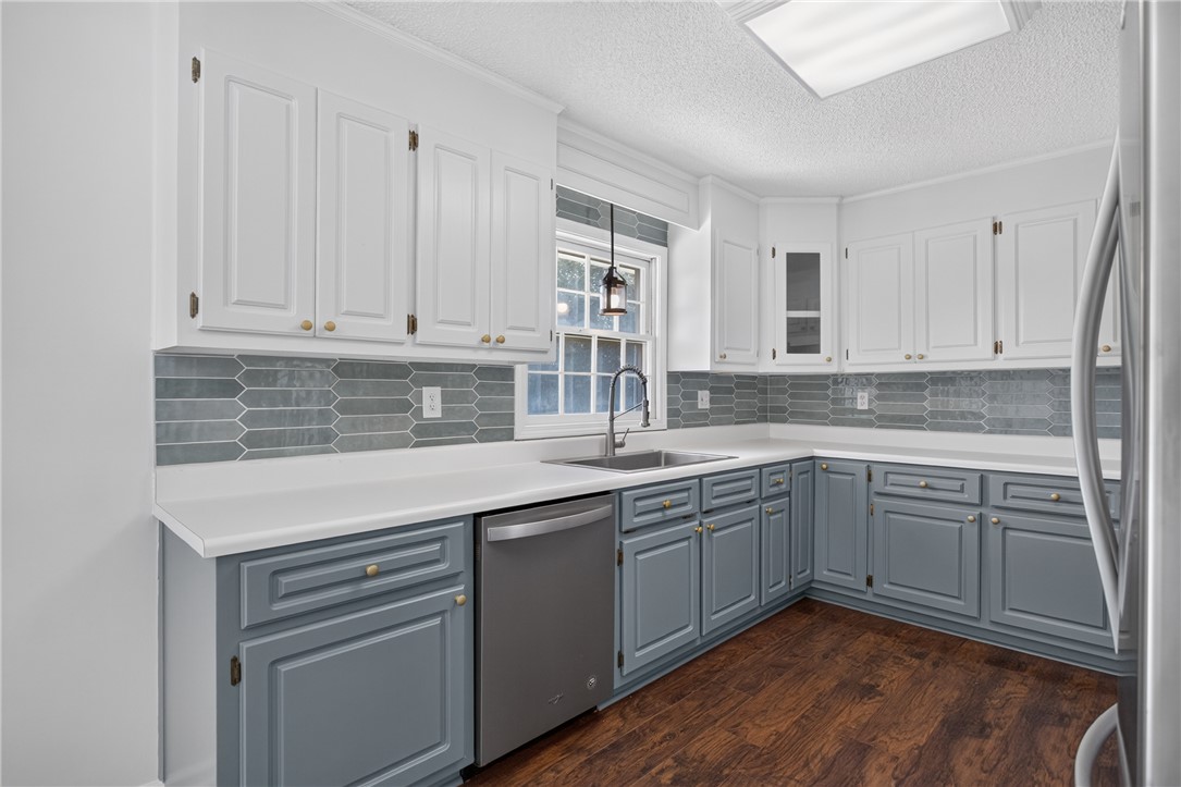 113 Greenfield Avenue Pendleton, SC 29670 - Photo 9 of 40 A well-lit kitchen with sleek appliances and ample counter space.