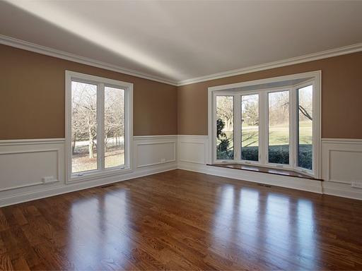 2295 Inverray Road Inverness, IL 60067 - Photo 8 of 16 a view of an empty room with wooden floor and a window