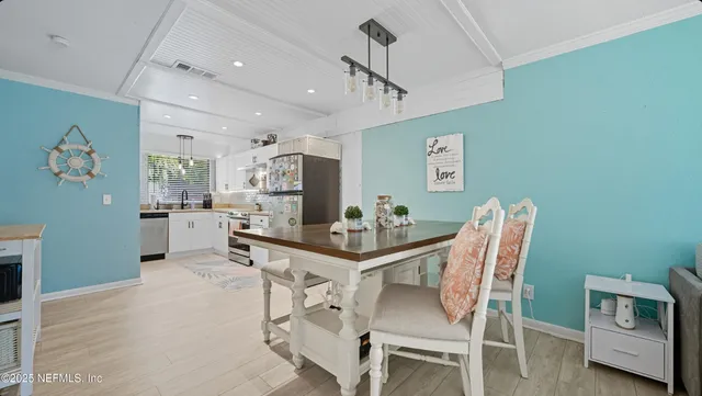 a room with furniture and flat screen tv