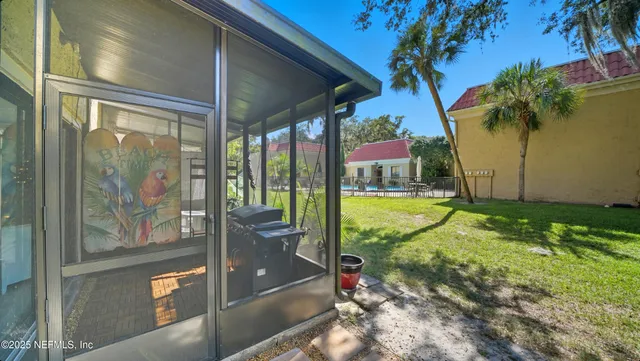 a view of a terrace with sitting area