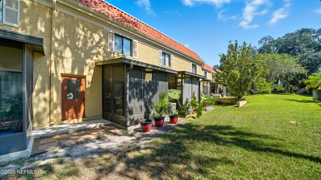 a view of swimming pool with outdoor seating