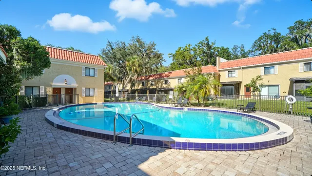 a view of a trees in front of a house