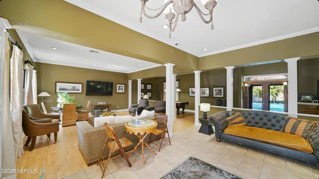 an aerial view of a house with a lake view