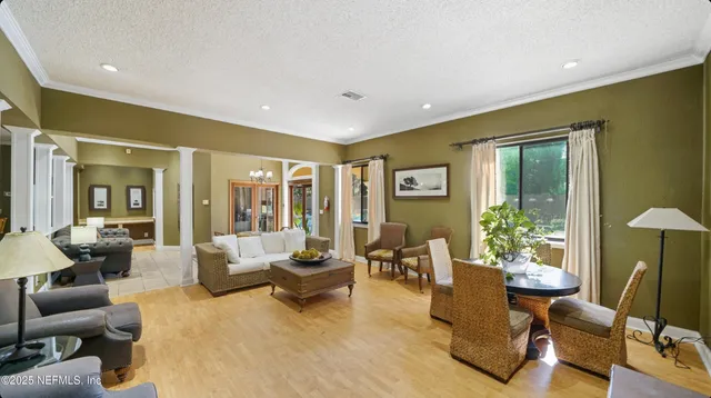 an aerial view of a houses with outdoor space and lake view