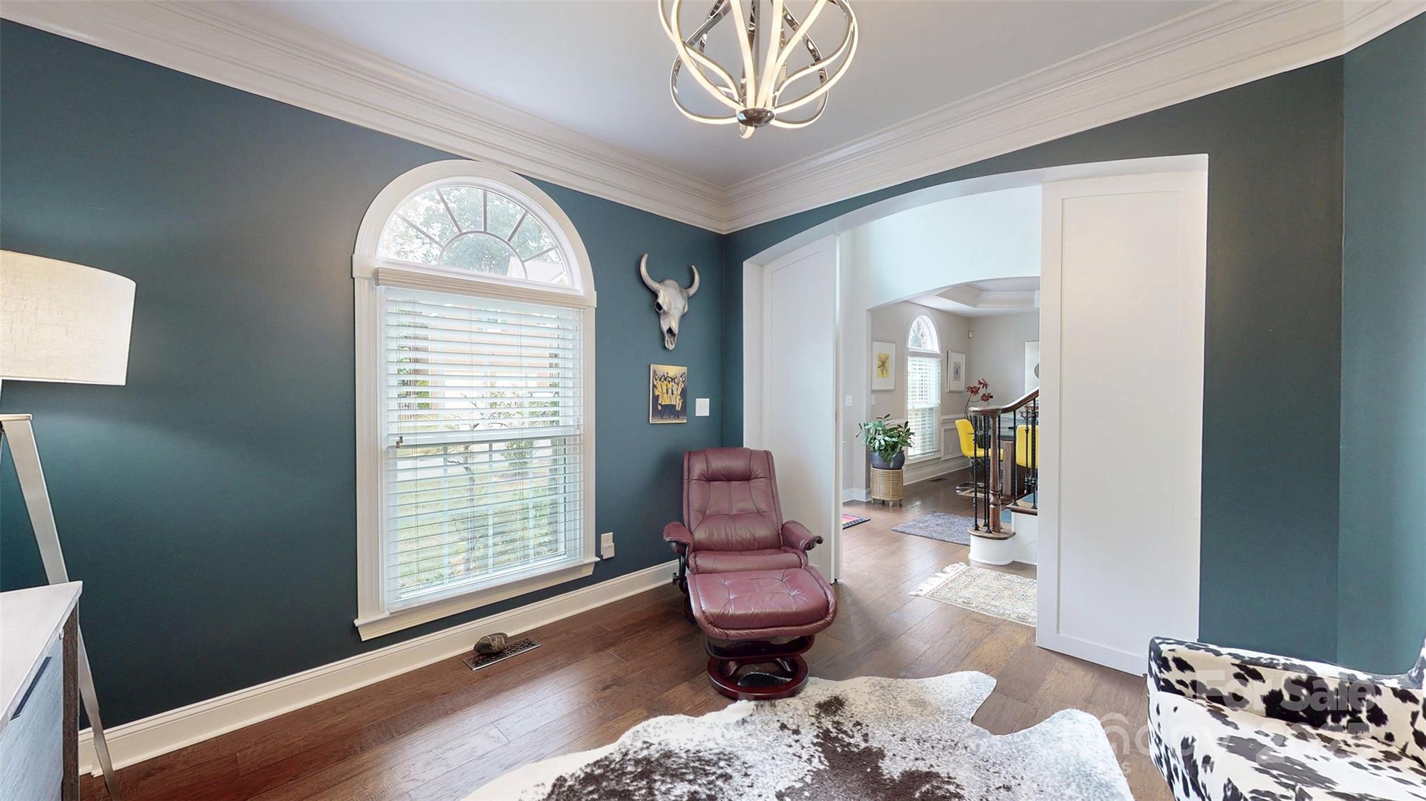 9014 Cardinal Ridge Court Charlotte, NC 28270 - Photo 16 of 45 a living room with furniture and a window