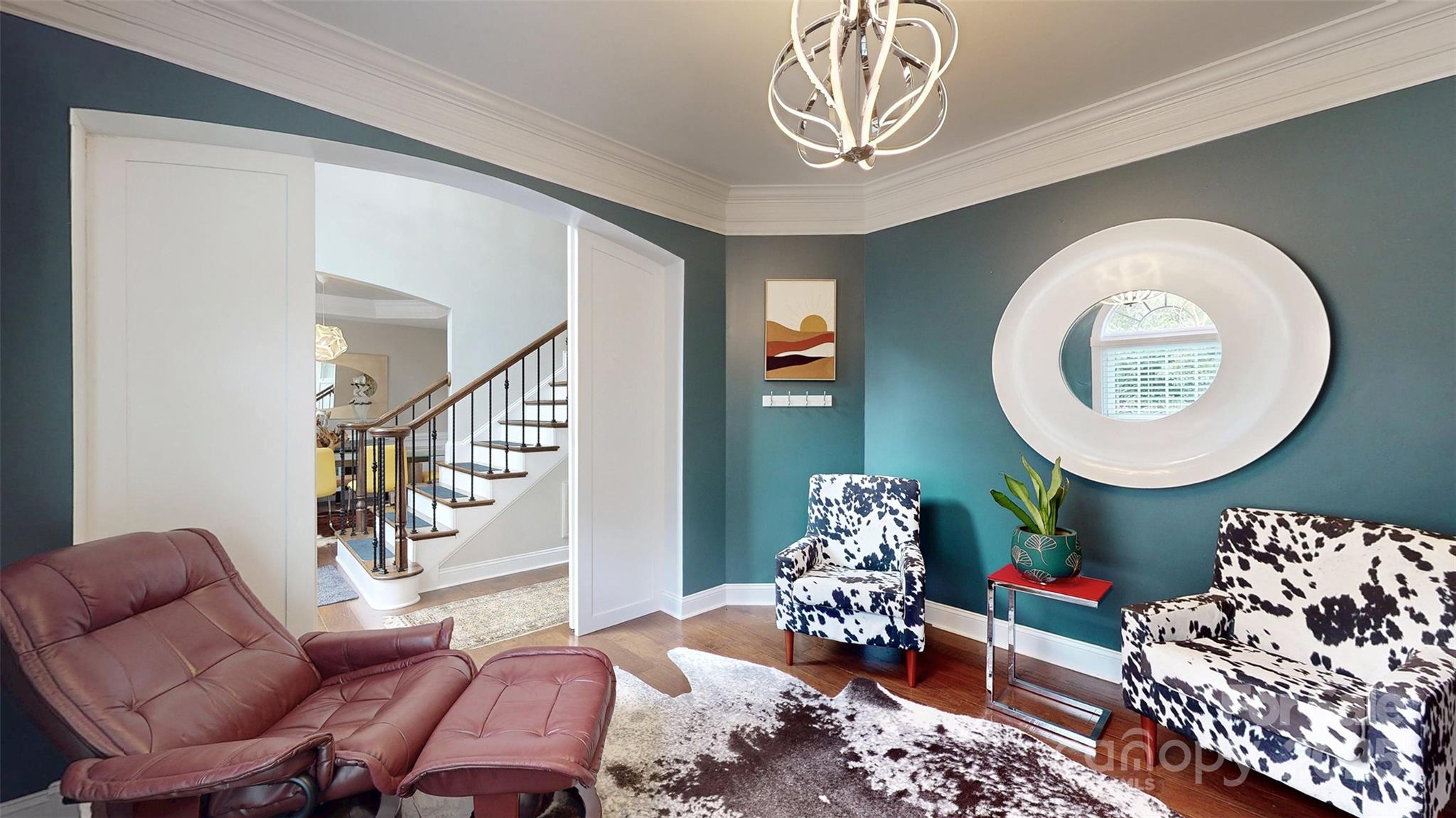 9014 Cardinal Ridge Court Charlotte, NC 28270 - Photo 17 of 45 a living room with furniture and a mirror