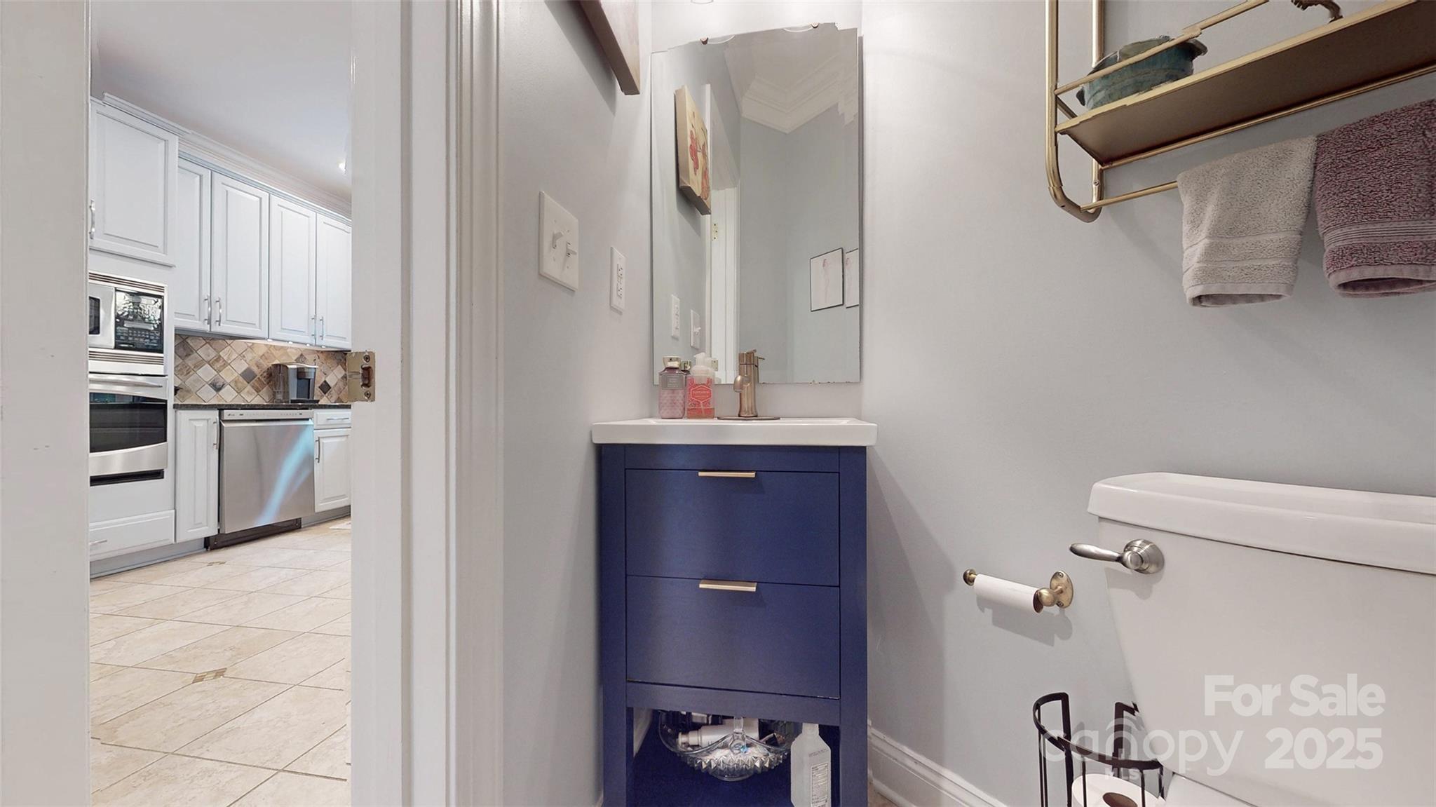 9014 Cardinal Ridge Court Charlotte, NC 28270 - Photo 21 of 45 a bathroom with a bathtub sink and toilet