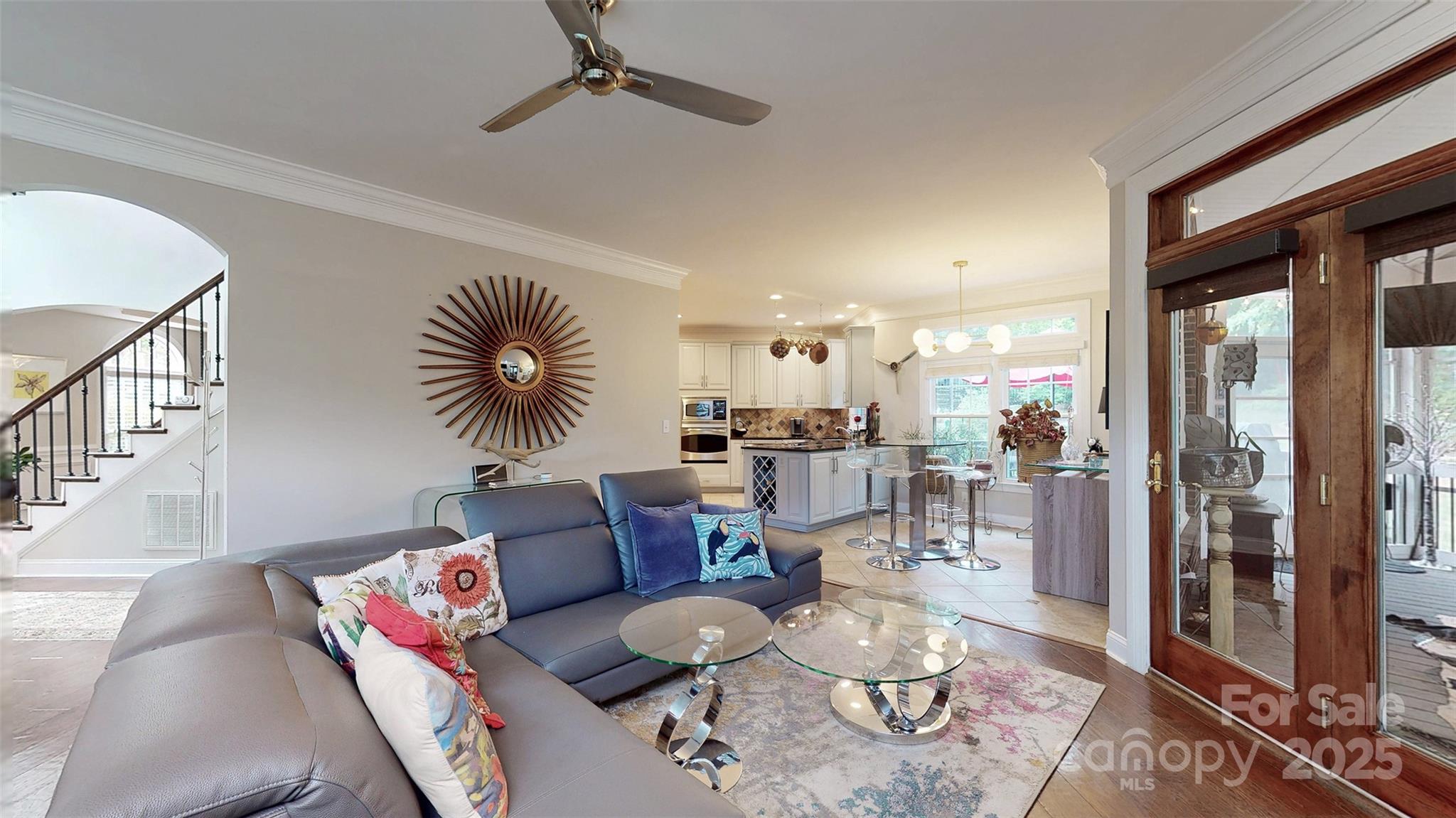 9014 Cardinal Ridge Court Charlotte, NC 28270 - Photo 34 of 45 a living room with furniture and a large window