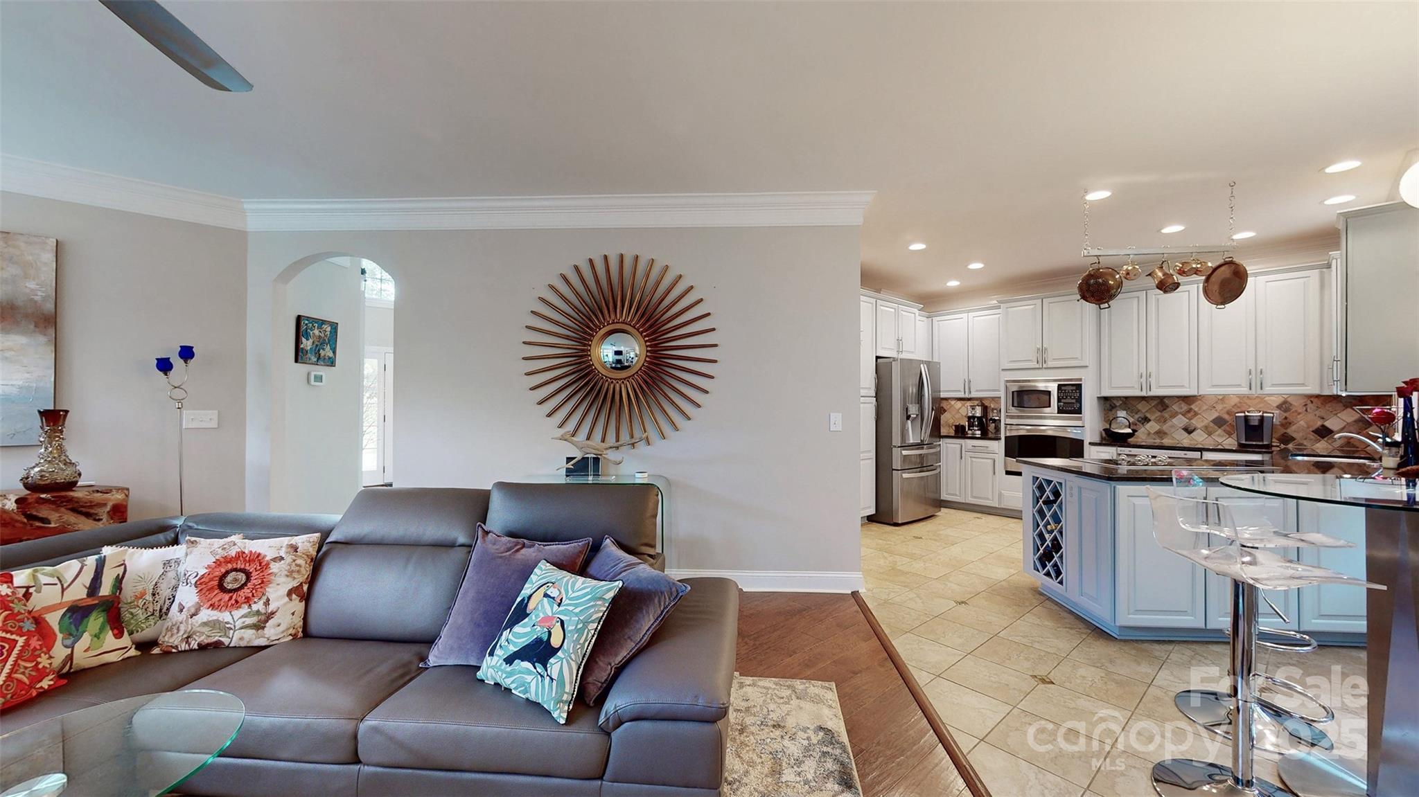 9014 Cardinal Ridge Court Charlotte, NC 28270 - Photo 35 of 45 a living room with furniture and kitchen view